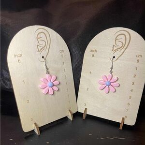 Charming Pink Floral Earrings with Blue Accent